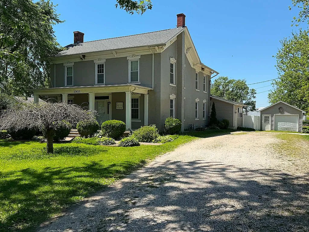 Charming Victorian Home with Wraparound Porch in Carrollton