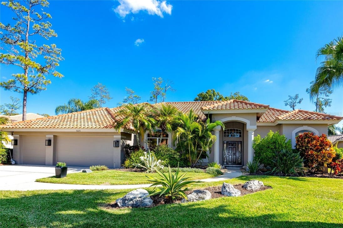 Luxury 5BR Executive Pool Home in Gated East Lake Woodlands Community